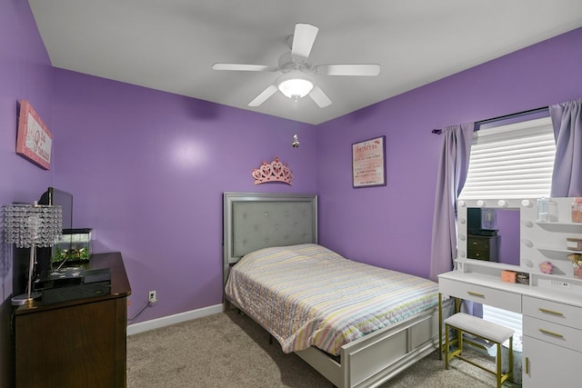 106 Lake Ln, Headland, AL 36345 - carpeted bedroom with baseboards and a ceiling fan