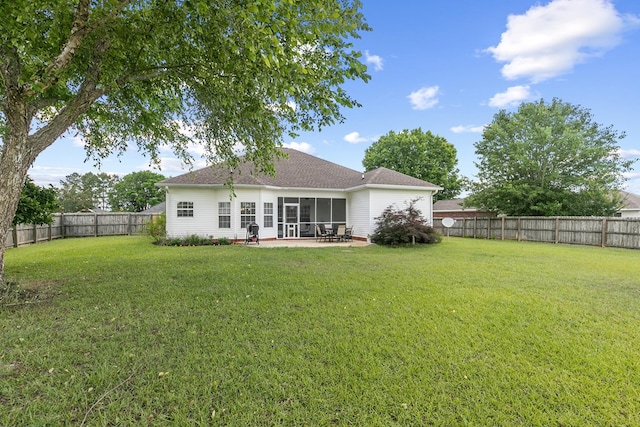 106 Lake Ln, Headland, AL 36345 - back of property with a sunroom, a patio, and a shingled roof