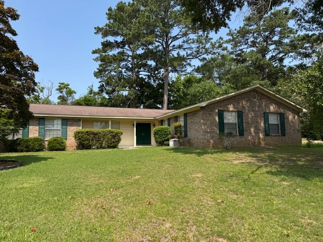203 Aspen Cir, Dothan, AL 36303 - ranch-style home featuring a front yard and brick siding