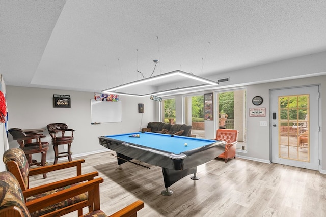 408 Shakespeare Dr, Dothan, AL 36303 - recreation room featuring billiards, a textured ceiling, light wood-type flooring, and baseboards