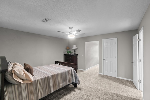 408 Shakespeare Dr, Dothan, AL 36303 - bedroom featuring light colored carpet, baseboards, ceiling fan, and a textured ceiling