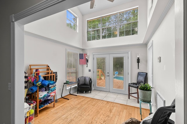 408 Shakespeare Dr, Dothan, AL 36303 - entryway featuring french doors, a high ceiling, wood finished floors, and a ceiling fan
