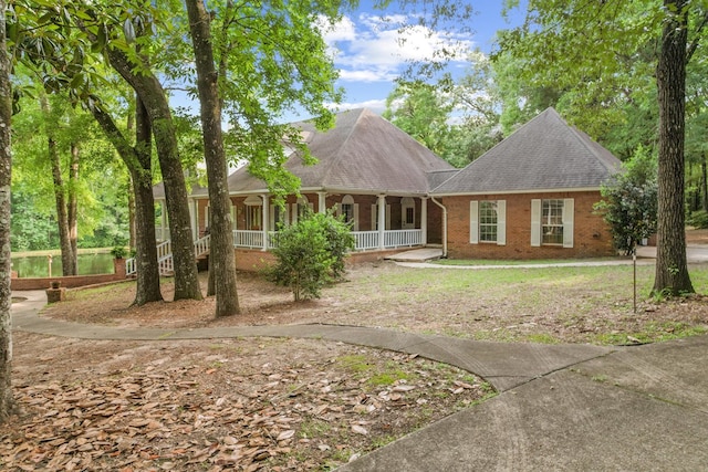408 Shakespeare Dr, Dothan, AL 36303 - ranch-style house with a porch, brick siding, and roof with shingles