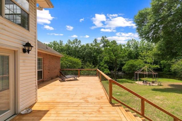 408 Shakespeare Dr, Dothan, AL 36303 - wooden deck featuring a yard, a gazebo, and view of wooded area