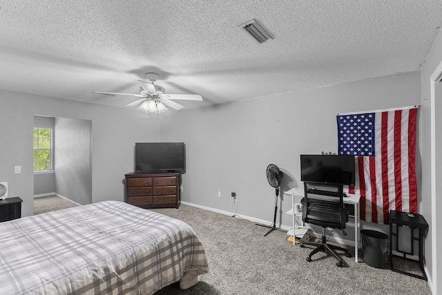408 Shakespeare Dr, Dothan, AL 36303 - bedroom with carpet, baseboards, a textured ceiling, and ceiling fan