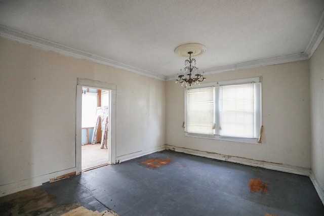 unfurnished room featuring crown molding and a chandelier