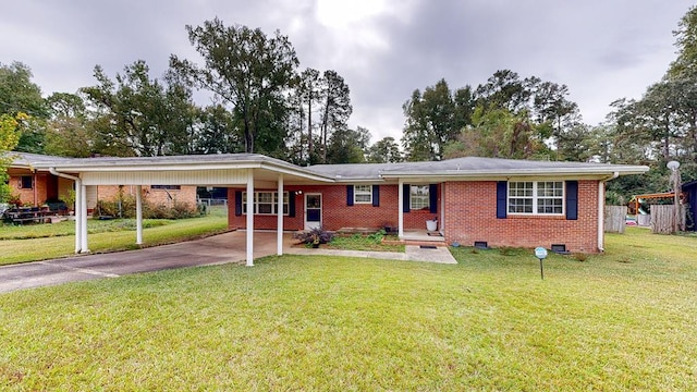 ranch-style home with a front lawn and a carport