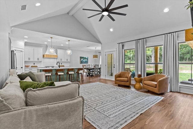 246 Suggs Rd, Dothan, AL 36345 - living area featuring a ceiling fan, beam ceiling, high vaulted ceiling, recessed lighting, and wood finished floors