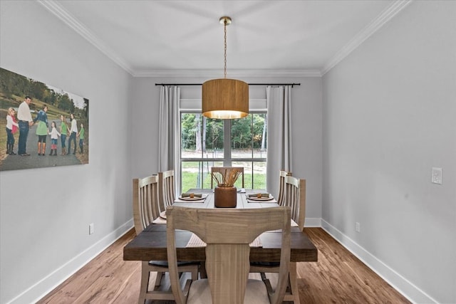 246 Suggs Rd, Dothan, AL 36345 - dining area with wood finished floors and ornamental molding