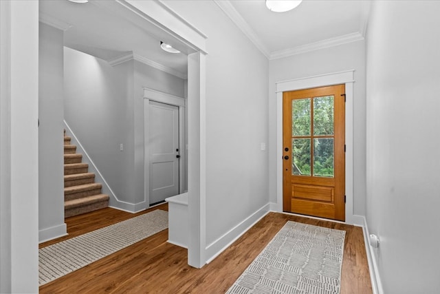 246 Suggs Rd, Dothan, AL 36345 - entrance foyer featuring wood finished floors, ornamental molding, and stairway