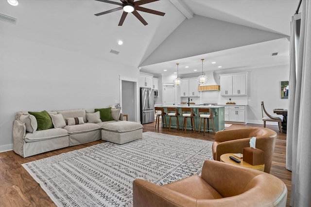 246 Suggs Rd, Dothan, AL 36345 - living area featuring ceiling fan, beamed ceiling, high vaulted ceiling, dark wood-type flooring, and recessed lighting