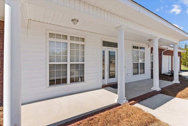 entrance to property with a porch