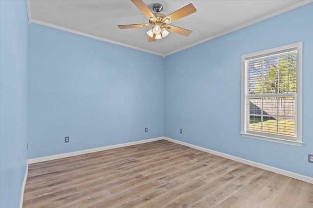 unfurnished room featuring ornamental molding, ceiling fan, and light hardwood / wood-style floors