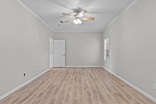 empty room featuring ornamental molding, ceiling fan, and light hardwood / wood-style flooring