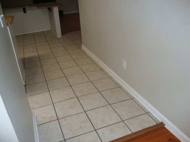 801 Early Walden Rd, Headland, AL 36345 - corridor with light tile patterned floors