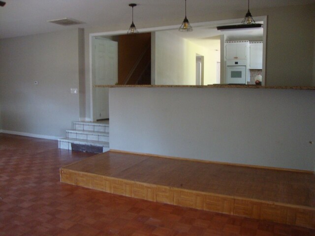 801 Early Walden Rd, Headland, AL 36345 - unfurnished living room featuring baseboards