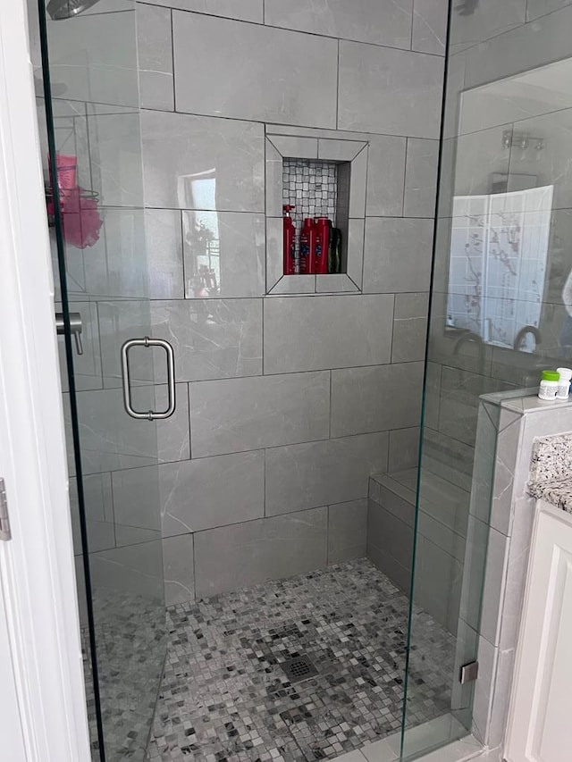 bathroom with a stall shower