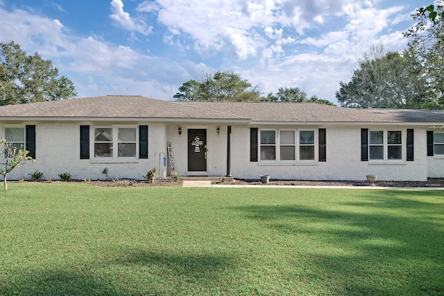 ranch-style house with a front yard