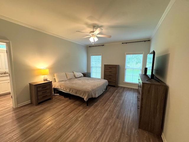 303 Courtland Dr, Dothan, AL 36301 - bedroom with ornamental molding, baseboards, dark wood-style floors, and ceiling fan