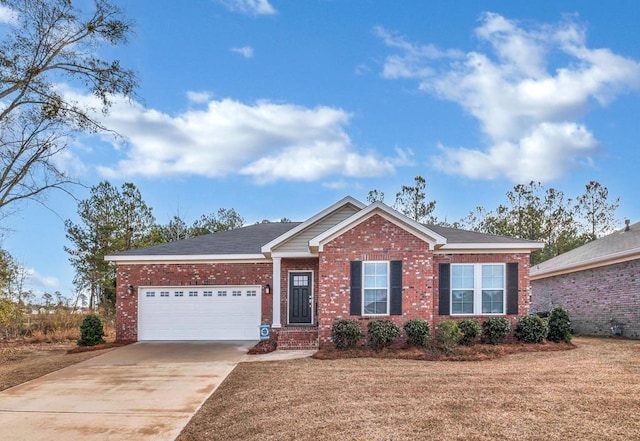 303 Courtland Dr, Dothan, AL 36301 - single story home with brick siding, a garage, driveway, and a front lawn