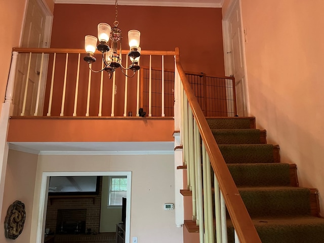 132 Ozark Rd, Abbeville, AL 36310 - stairs with crown molding, a chandelier, and a fireplace