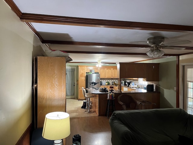 132 Ozark Rd, Abbeville, AL 36310 - living area with ceiling fan, light wood-style floors, and beam ceiling