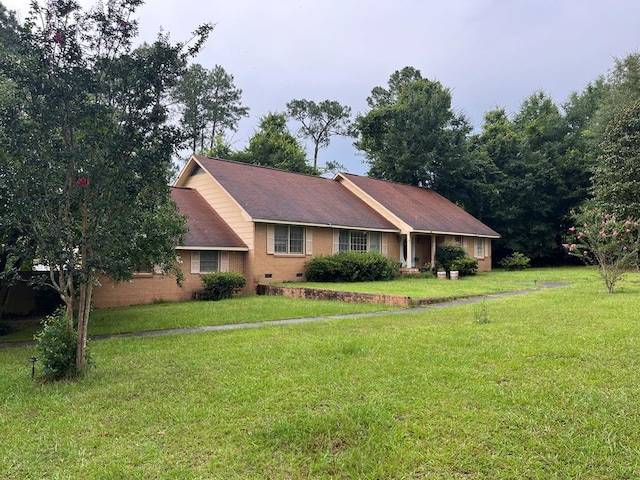 132 Ozark Rd, Abbeville, AL 36310 - ranch-style home with a front lawn and crawl space