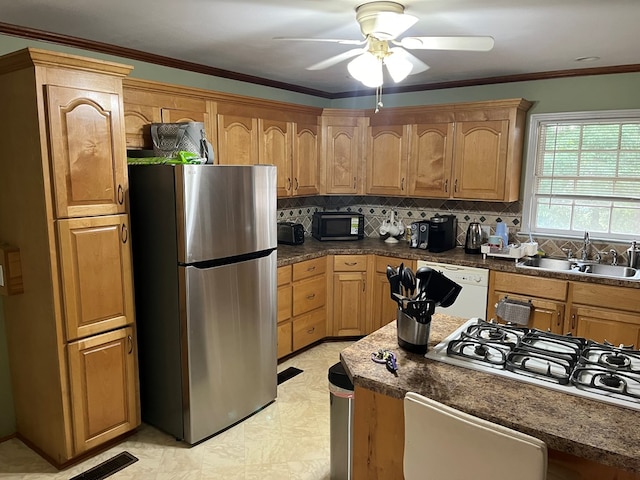 132 Ozark Rd, Abbeville, AL 36310 - kitchen featuring freestanding refrigerator, dishwasher, a ceiling fan, decorative backsplash, and gas cooktop