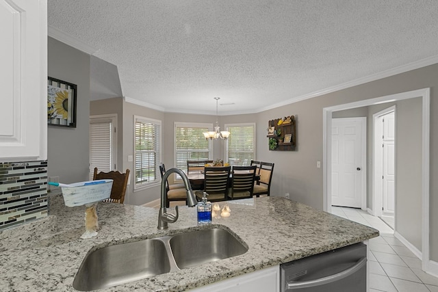 208 Willow Oaks Dr, Headland, AL 36345 - kitchen featuring light tile patterned flooring, white cabinets, decorative backsplash, stainless steel dishwasher, and a sink