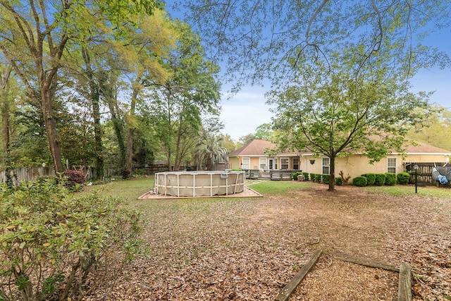 208 Willow Oaks Dr, Headland, AL 36345 - view of yard with an outdoor pool and fence