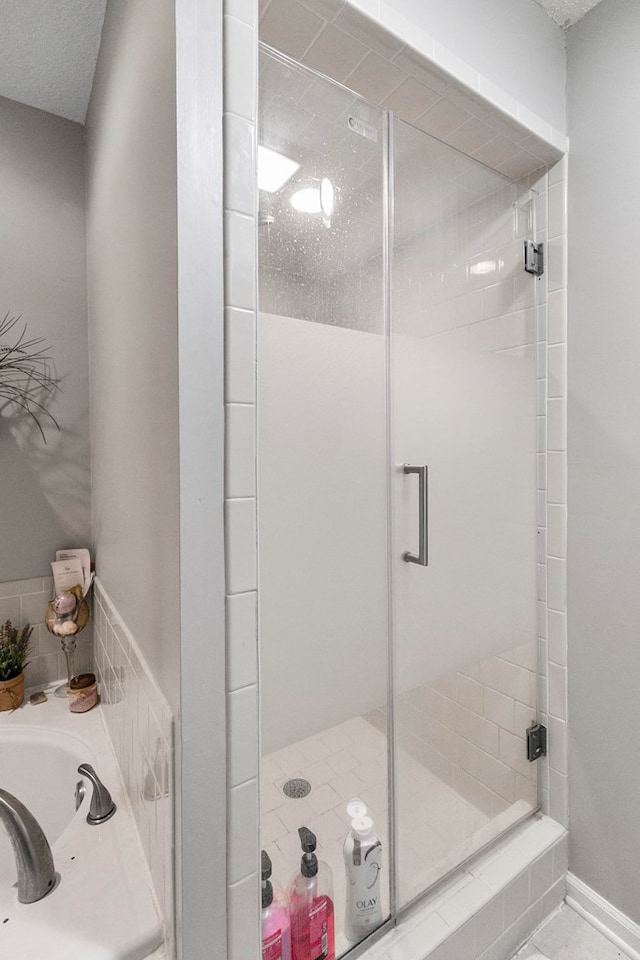 208 Willow Oaks Dr, Headland, AL 36345 - bathroom with a shower stall and a bath