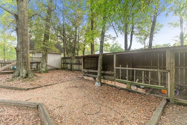 208 Willow Oaks Dr, Headland, AL 36345 - view of yard with an outdoor structure and fence