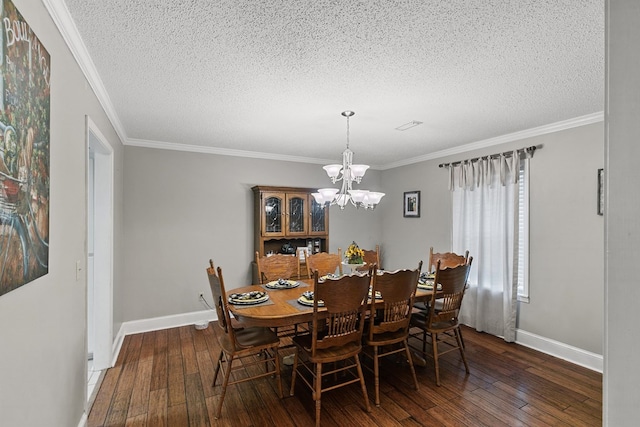 208 Willow Oaks Dr, Headland, AL 36345 - dining area featuring ornamental molding, hardwood / wood-style floors, and a chandelier