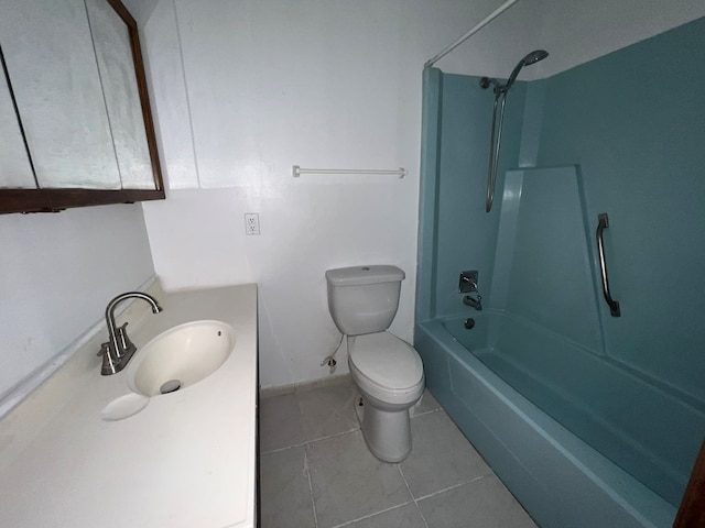 full bathroom with tile patterned flooring, washtub / shower combination, toilet, and vanity