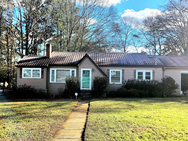 ranch-style home with a front yard