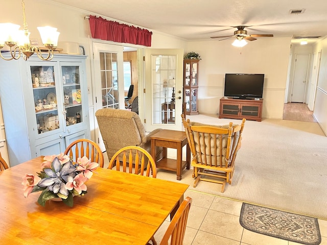 869 Bethlehem Rd, Midland City, AL 36350 - dining area featuring ornamental molding, a ceiling fan, a chandelier, french doors, and tile patterned flooring