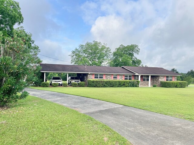869 Bethlehem Rd, Midland City, AL 36350 - single story home featuring a front lawn, driveway, and a carport