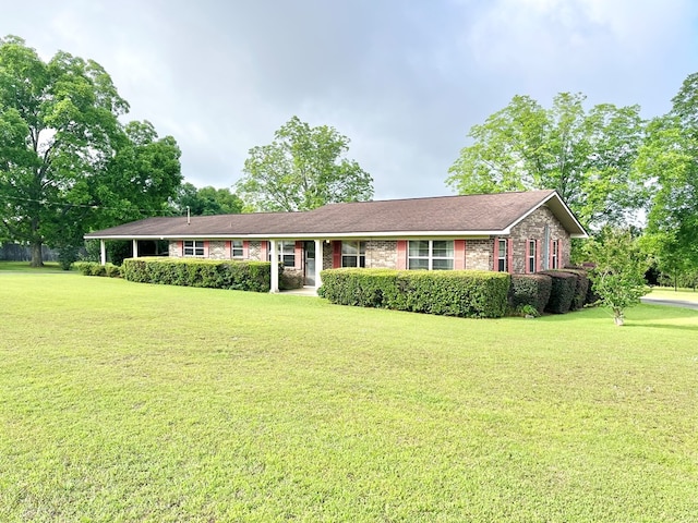869 Bethlehem Rd, Midland City, AL 36350 - ranch-style house with a front lawn and brick siding