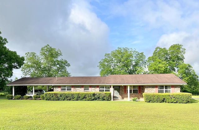 869 Bethlehem Rd, Midland City, AL 36350 - single story home with a front lawn, brick siding, and a carport