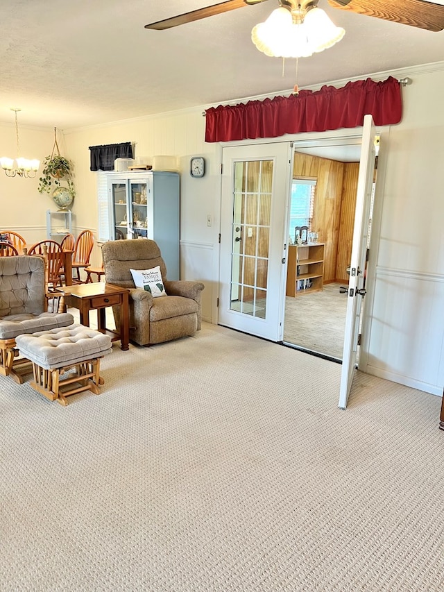 869 Bethlehem Rd, Midland City, AL 36350 - living room with carpet floors, a ceiling fan, a chandelier, and french doors