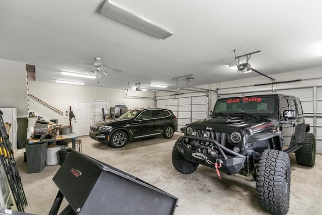 306 Halifax Dr, Dothan, AL 36305 - garage featuring a garage door opener and a ceiling fan