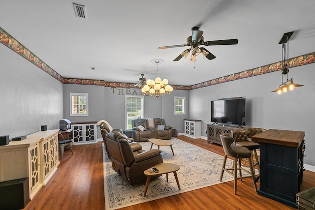 306 Halifax Dr, Dothan, AL 36305 - living area featuring a chandelier, ceiling fan, and wood finished floors