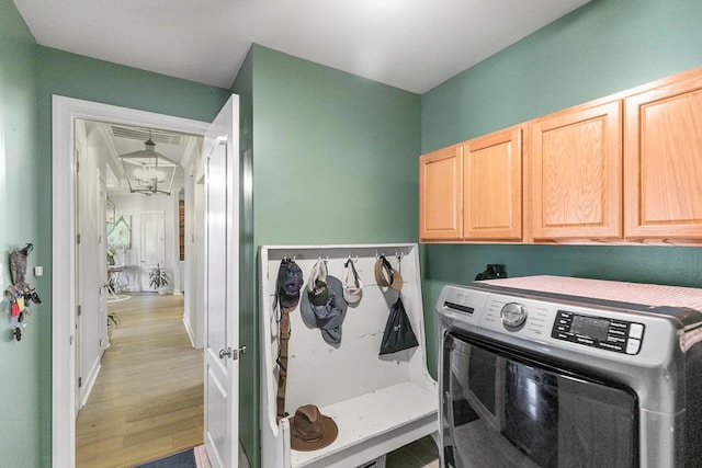 306 Halifax Dr, Dothan, AL 36305 - washroom featuring cabinet space, washer / dryer, and light wood-type flooring