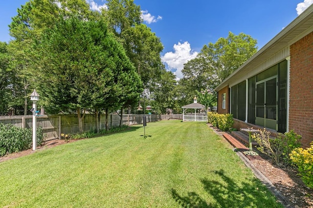 306 Halifax Dr, Dothan, AL 36305 - fenced backyard featuring a gazebo