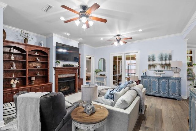 306 Halifax Dr, Dothan, AL 36305 - living area with ceiling fan, a fireplace, recessed lighting, light wood-style flooring, and crown molding