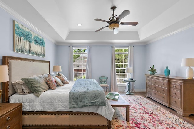 306 Halifax Dr, Dothan, AL 36305 - bedroom featuring a tray ceiling, wood finished floors, recessed lighting, crown molding, and ceiling fan