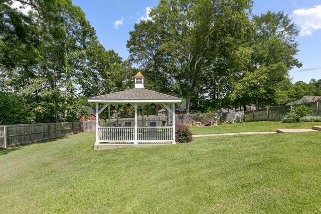 306 Halifax Dr, Dothan, AL 36305 - fenced backyard with a gazebo