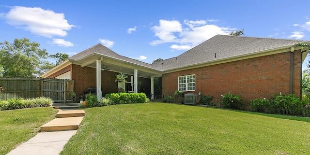 306 Halifax Dr, Dothan, AL 36305 - rear view of house with brick siding, ceiling fan, and a shingled roof