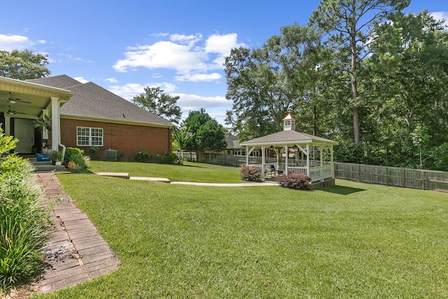 306 Halifax Dr, Dothan, AL 36305 - fenced backyard with a gazebo and ceiling fan