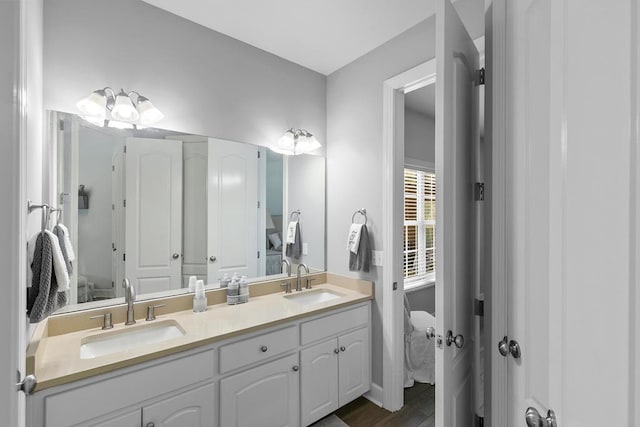 306 Halifax Dr, Dothan, AL 36305 - ensuite bathroom with double vanity and baseboards